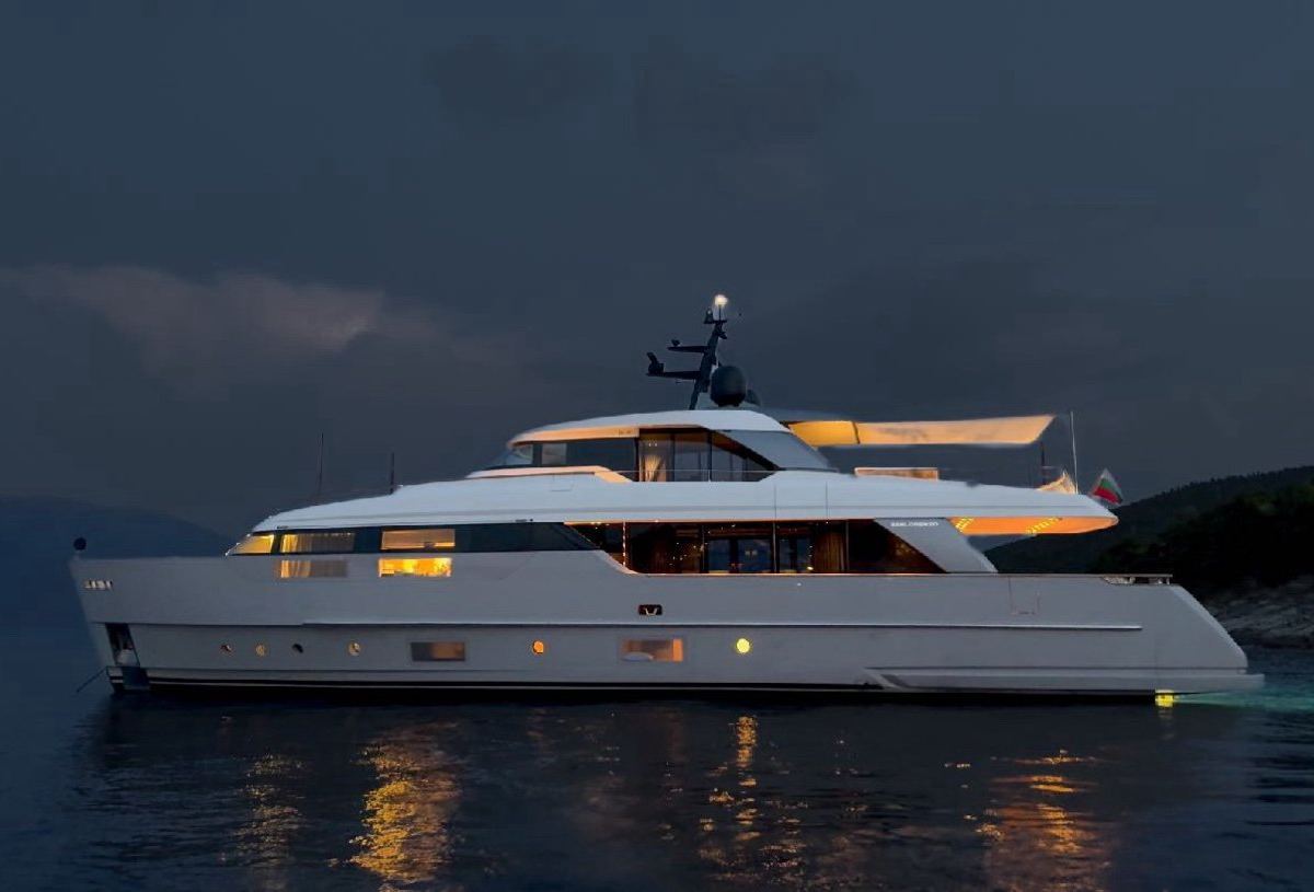 FLORI lit at anchor at night